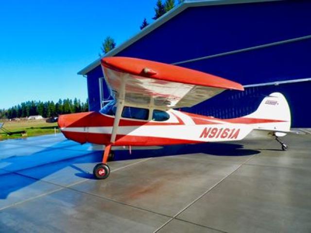 Cessna taildragger on airport tarmac